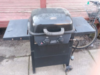 Two burner barbecue with tank