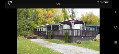 2015 Northlander Escape seasonal trailer on executive golf course at Bellmere Winds Golf Resort 10mi...