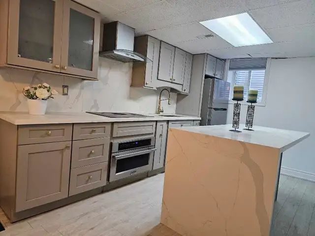 Renovated 2 bed 1 den Basement Apartment Large Windows  in Long Term Rentals in City of Toronto - Image 2