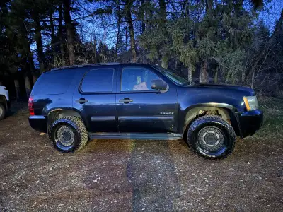 2012 Chevy Tahoe Black 215,000km Currently on the Road 4x4 Leveling Kit Third row seating Well Maint...