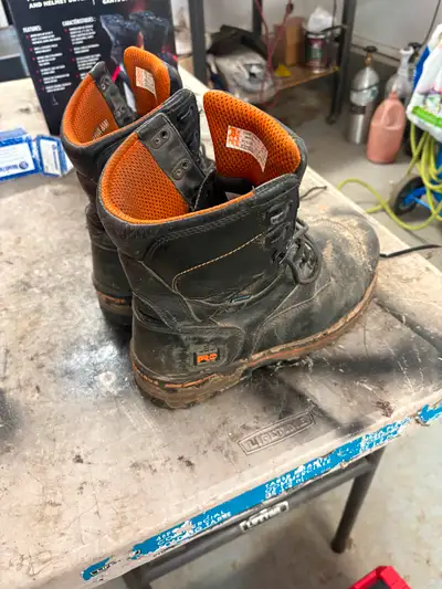 2 pair of workboots. They have been worn about a dozen times each so the condition is great. 1. Timb...