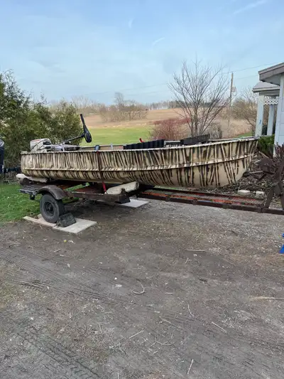 Everything you need to get out fishing. Package deal with trailer and 9.9 Johnson and Minn Kota 55 t...