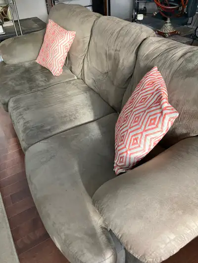 Complete set includes a couch 94”, a leather lazy boy chair, a coffee table 48x24, two end tables 24...