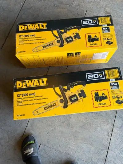 Brand new 12 inch Dewalt cordless chainsaw comes with five amp battery and charger brand new in the...