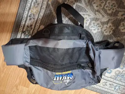 Seat Saddlebag 3 compartments, drink holder. Great for keeping Licence, keys, gear etc handy