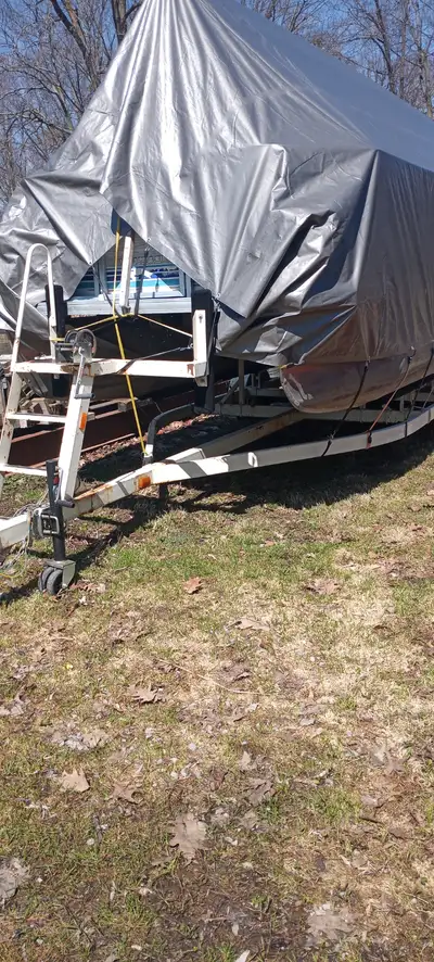Bunk style pontoon trailer. (pictured is a 21ft boat on it), was set up for a 24ft boat when I got i...