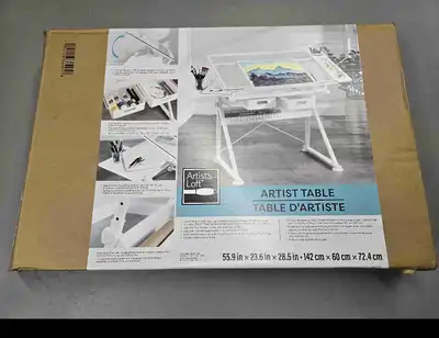 New in box artist table. Approx 56x24x29. White with a nice glass top. Was clearance at Michaels but...