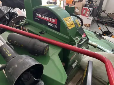 I am selling a Wallenstein BX52R wood chipper, a robust machine designed for efficiently processing...