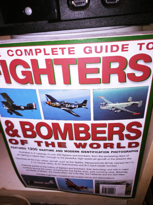 BOOK OF BOMBER PLANES in Textbooks in Sarnia