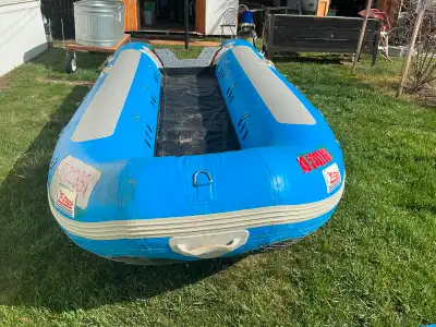 Inflatable Boat Back of tubes 26 inches wide Raised floor 12 inches high Floor Width 26 inches 900 k...
