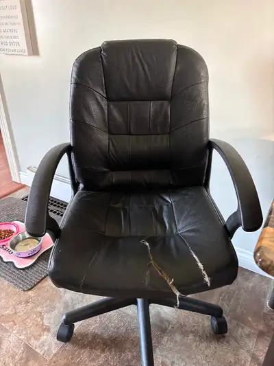 Used desk chair, very comfortable. Rip to front. Asking $40 OBO