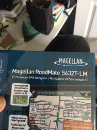 4 wheel hose reel cart - Magellan  GPS  Both NEW in Boxes