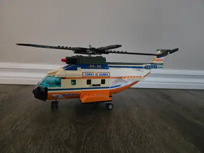 As pictured, this now vintage lego set, 7738. This helicopter is roughly 6 inches tall, and 14inches...