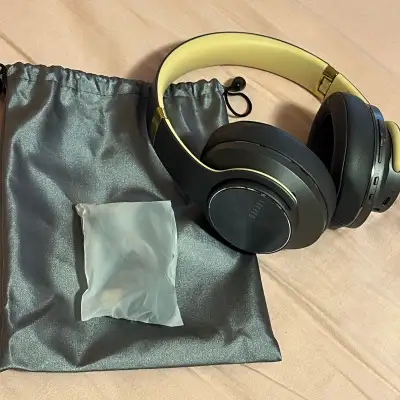 New Doqaus headphones + charger! Never used and in amazing condition. Cash only! Pick up only!