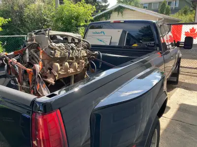 2001 Chev/GMC 8100 Vortec Good rebuild able core It ran Long block with intake ,flex plate and valve...