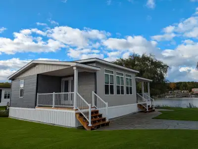 This 2-bedroom, 2-bathroom Beausoleil Cottage model, proudly manufactured in Canada, is move-in read...