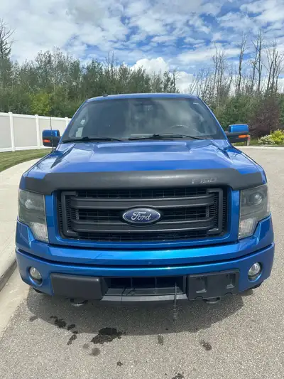 Looking for a tough, reliable and stylish truck? This 2014 Ford F15 FX4 SuperCrew 4x4 delivers power...