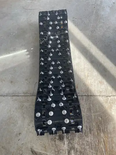 Polaris XCR 128” x 15” x 1.6” cobra track. A few stud pull thru. Had to change bearings so ended up...