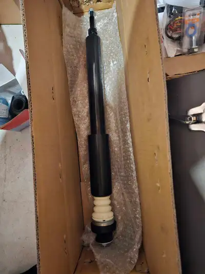 One rear shock strut and one rear shock strut mount. Originally bought for 2014 BMW X1 XDRIVE28I. Sh...