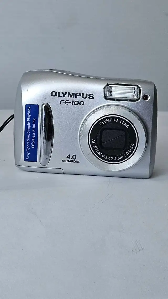 Olympus FE-100  4.0 MP  Compact Digital Camara557472365696798725