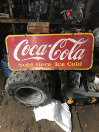 Coca Cola sign and handle 