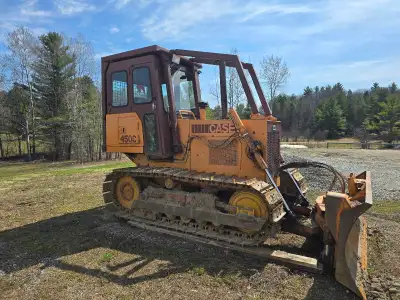 Well-maintained 1989 Case 450C dozer with cab with only 6000 hours for the year. Machine is in good...