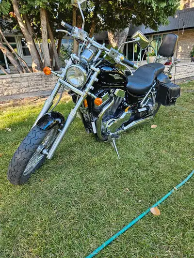 Black & chrome 2006 Suzuki. Huge engine. Shaft drive. Lots of power. 15,000 kms. Quick detachable wi...