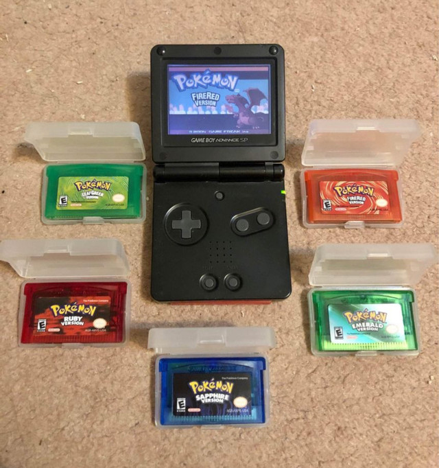 Gameboy Advance SP with 5 Games in Older Generation in Calgary