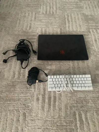Used like new 2020 MSI gameing laptop includes Model glorious 0 Mouse Razor Huntsman mini keyboard