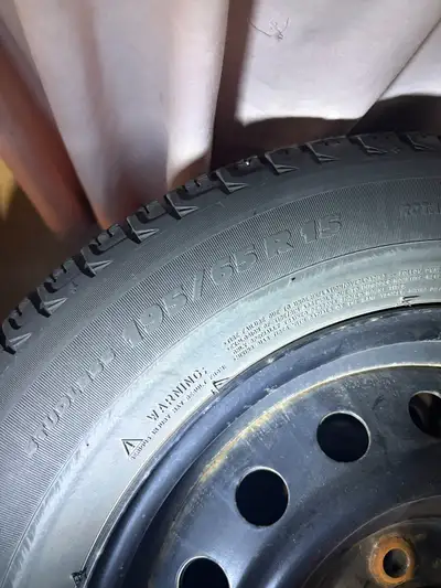 4 x 15" winter tires on rims 195/65 R15 5x100mm bolt pattern Tires are off a 2013 Toyota Corolla Jus...