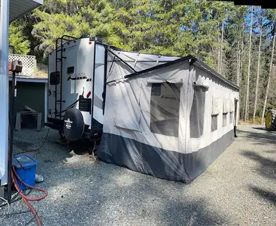 Coms with: Carefree Awning Portable septic tank and assessors