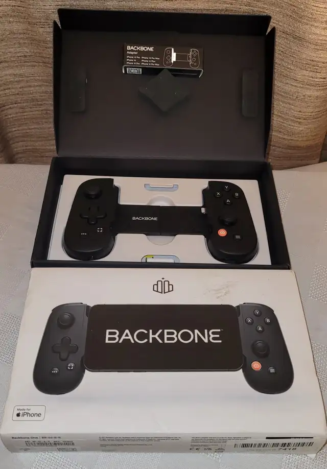 Original PS 1 - 30 game holder / Backbone One iphone controller in Older Generation in Red Deer - Image 11