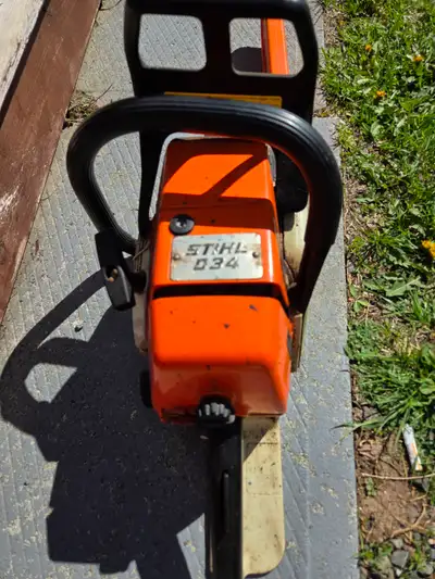 . Chainsaw $325.00 OBO. Not many hours on it. Phone Darrell:902 577 3116.