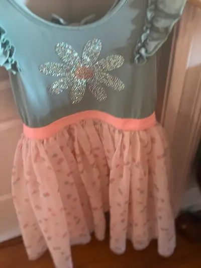 Worn once Top is a jersey type material Size 7