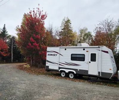 19 ft travel trailer. Nice layout big couch pull out to a goid size comfortable bed. Table can sleep...