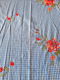 Roll end of embroidered polyester