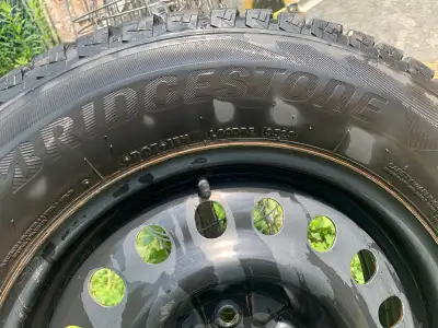 Used one and a half winter season and cost me 1629$ from Canadian Tire Size 235/65 R 17 The pickup a...