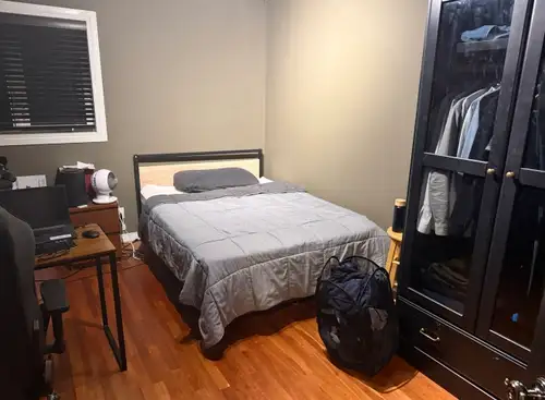 Spacious room on main floor. Furnished with bed, armoir, full closet. Bathroom shared with one perso...