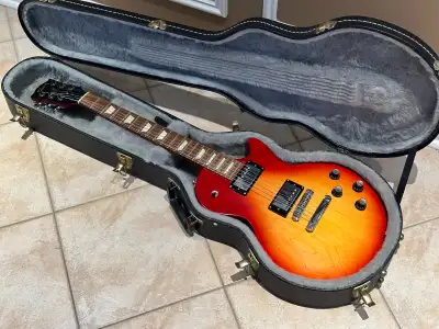 2020 Gibson Les Paul Tribute in satin cherry burst finish. In excellent condition overall except 2 t...