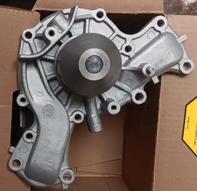 New in box water pump, with gasket. 3.0 liter V-6 engines