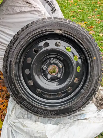 Bridgestone Blizzak Winter Tires 225-45-17 91H, WS90FZ, mounted on 17" steel rims. Only used one win...