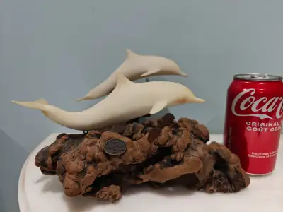 1973 John Perry USA made pellucid dolphins on burlwood sculpture, View more