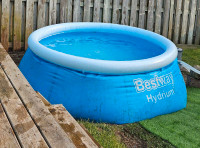8 ft pool with pump. 