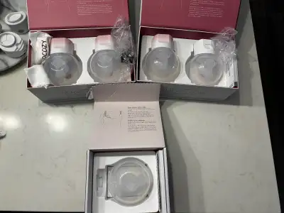 2 Sets of Momcozy S12 Pro pumps and one single pump, View more