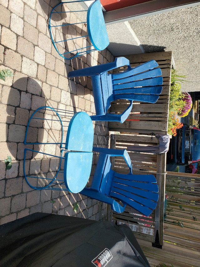 Two plastic Adirondack chairs and three side tables Free Stuff