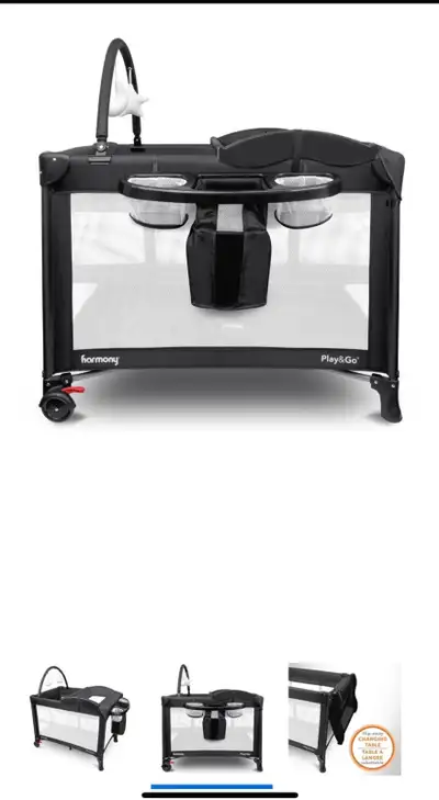 Purchased new and includes bassinet, change table with space for diapers and wipes, mobile and carry...