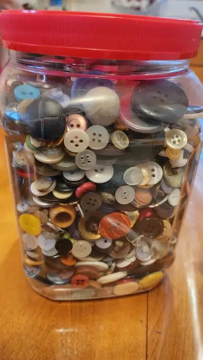 Container full Of Various Buttons, View more