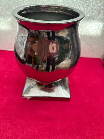 Add a touch of elegance to your decor with this stylish chrome Torntoft Lane table urn vase, perfect...