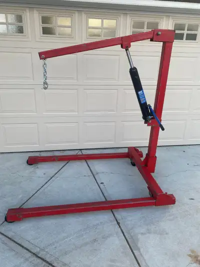 Knock down heavy duty engine crane. Legs are 2.5" X 13/64" square tubing, post is 3" X 1/4" square t...
