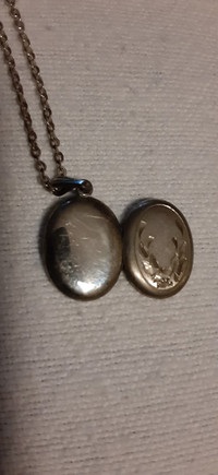 SILVER CHAIN AND LOCKET  $50